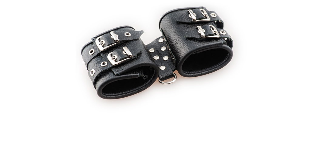 Black leather cuffs buckled together