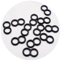 Circular image of black bra strap rings and slides